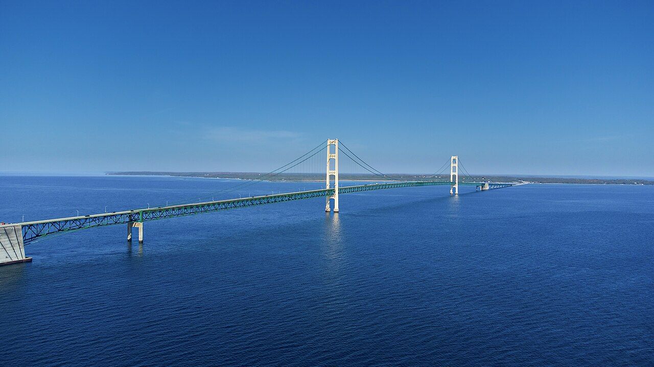 The Mackinac Bridge over the Straits under a blue sky