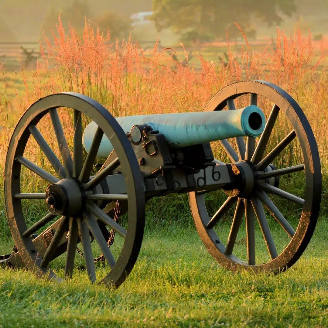 A cannon on the Gettysburg battlefield in autumn grass