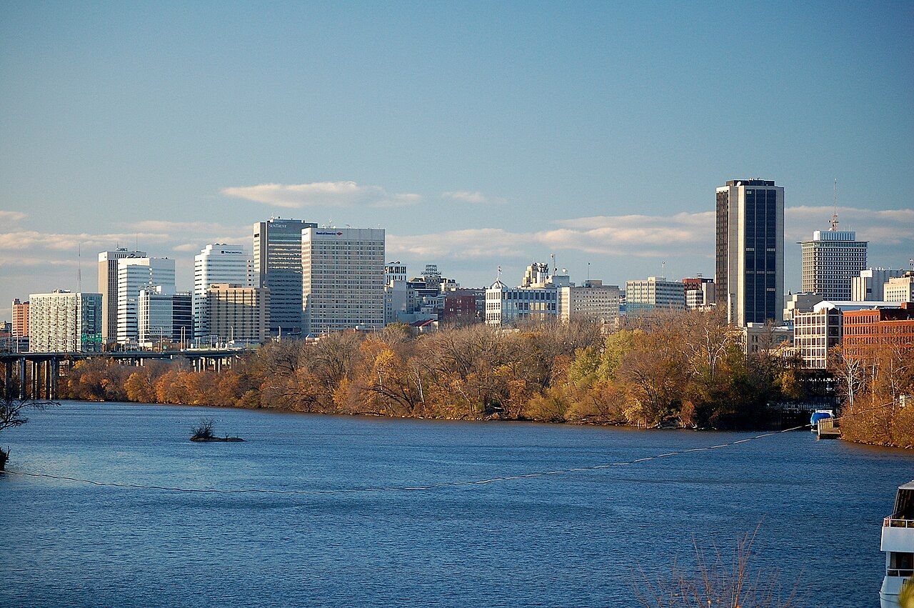 The Richmond skyline above the James River in fall